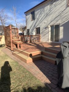 before and after old patio replaced with paver patio in Colorado