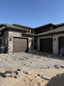 Heated paver driveway snow melt system installed beneath driveway surface during construction.