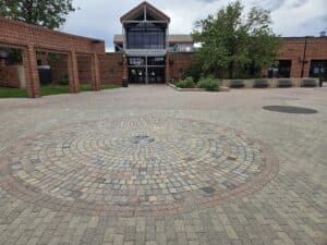 commercial paver drive lane installation built to handle vehicle traffic