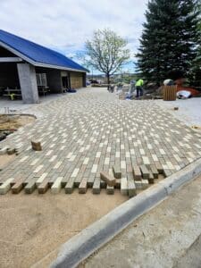 Alt: commercial paver walkway installation in Denver for high foot traffic areas
