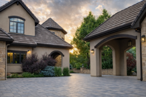 Before and after paver driveway transformation in Denver showing upgraded curb appeal and professional installation