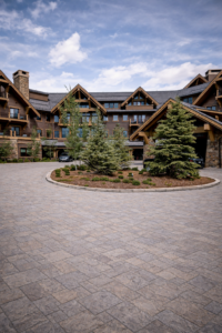 paver driveway installation in Colorado with circular design, clean stone pavers, and enhanced curb appeal