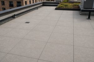 porcelain pedestal paver roof deck system with hidden drainage and modern outdoor finish