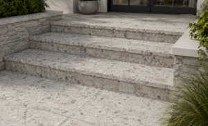 premium porcelain paver walkway and front home entry with durable low maintenance pavers